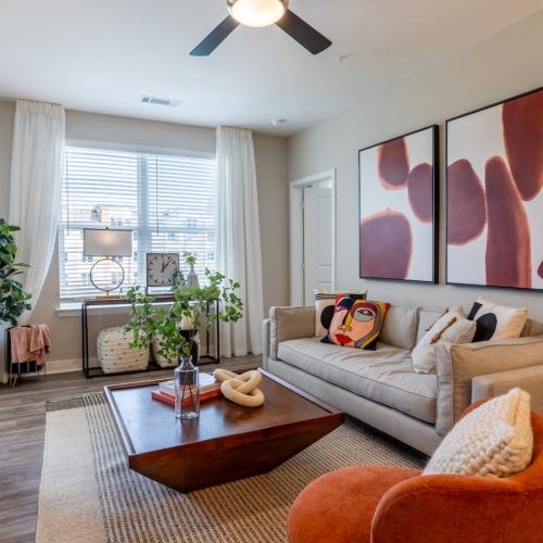 spacious living room with chic furnishings in a Bainbridge Cary apartment home